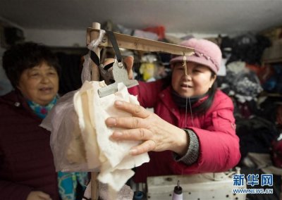 “一元裁缝铺”:冬日里的温暖坚守